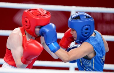 ​组图：拳拳到肉 亚运拳击场馆掌声喝彩不断